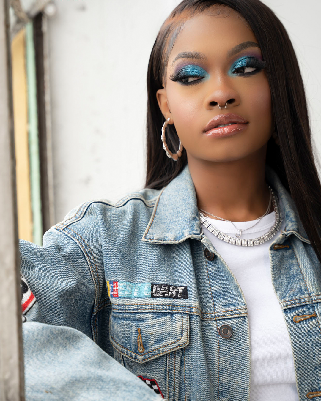 Model wearing creative makeup from The All I Need Collection.