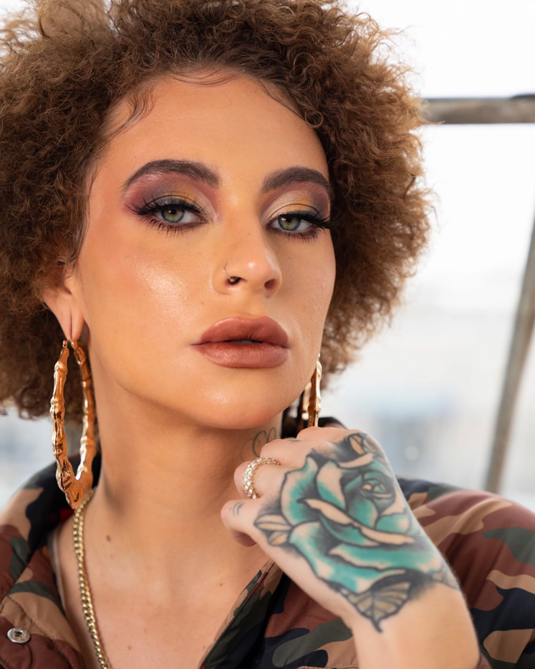 Model wearing creative makeup using The All I Need Eyeshadow Palette.