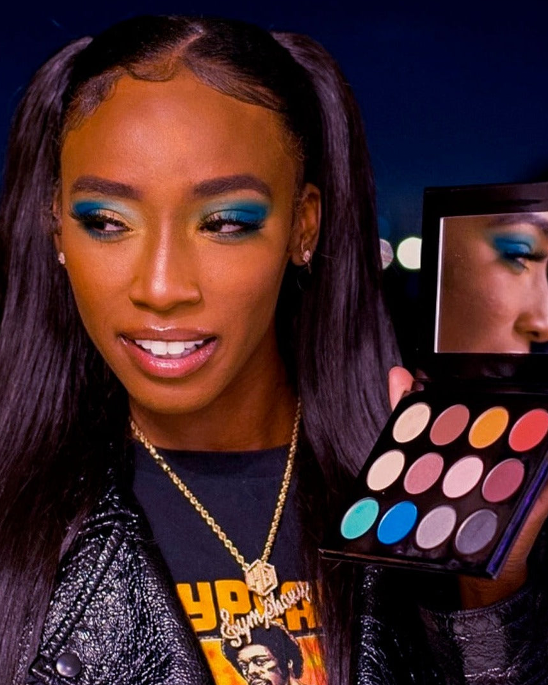 Model wearing creative makeup using The All I Need Collection.