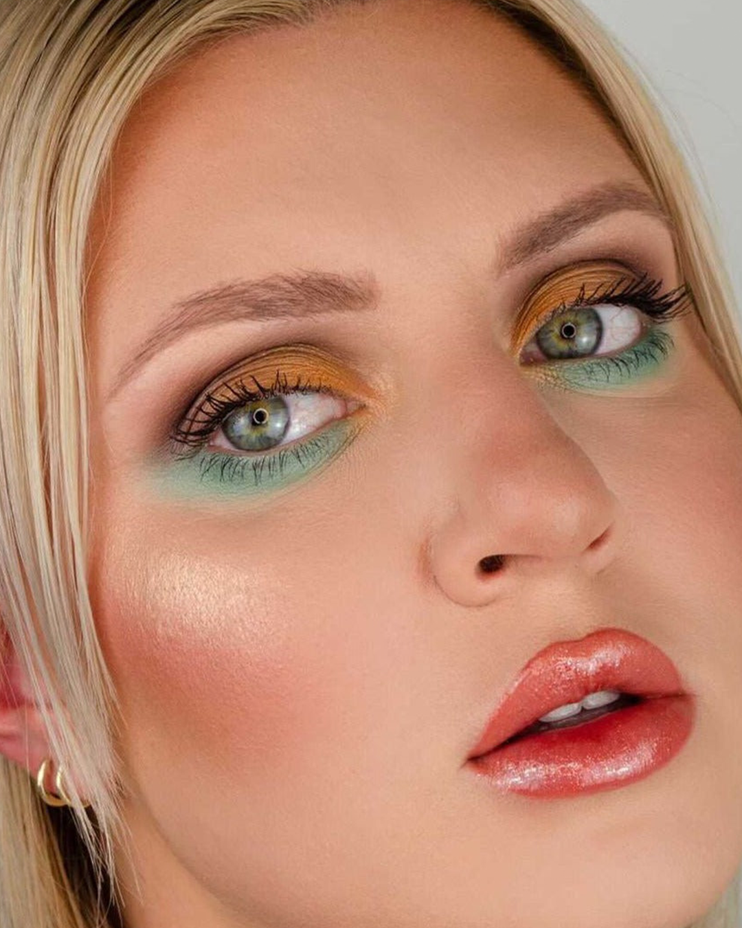 Model wearing creative makeup using The All I Need Collection.