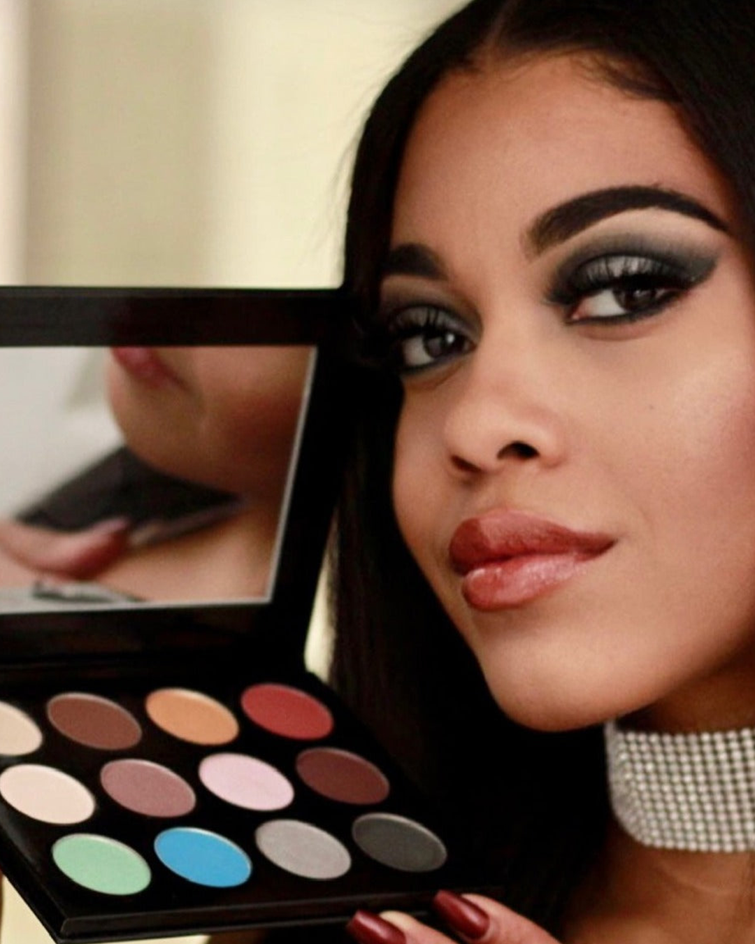 Destiny Jones wearing creative makeup using The All I Need Collection.