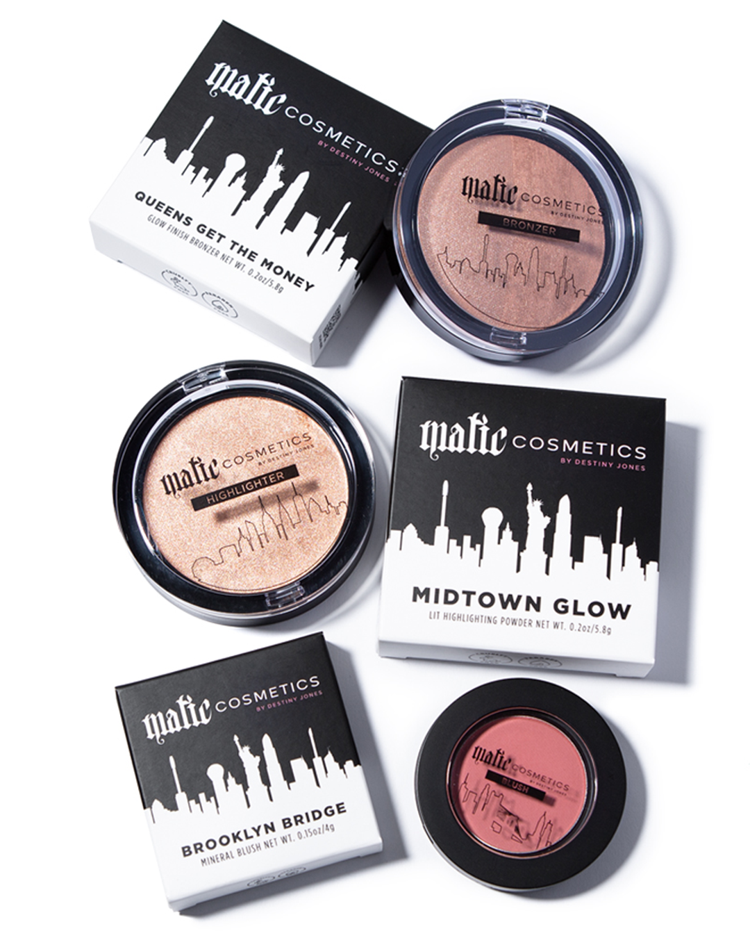 A collection of four cosmetic products including a bronzer, highlighter, and two blushes, with packaging displaying the brand name and product title.