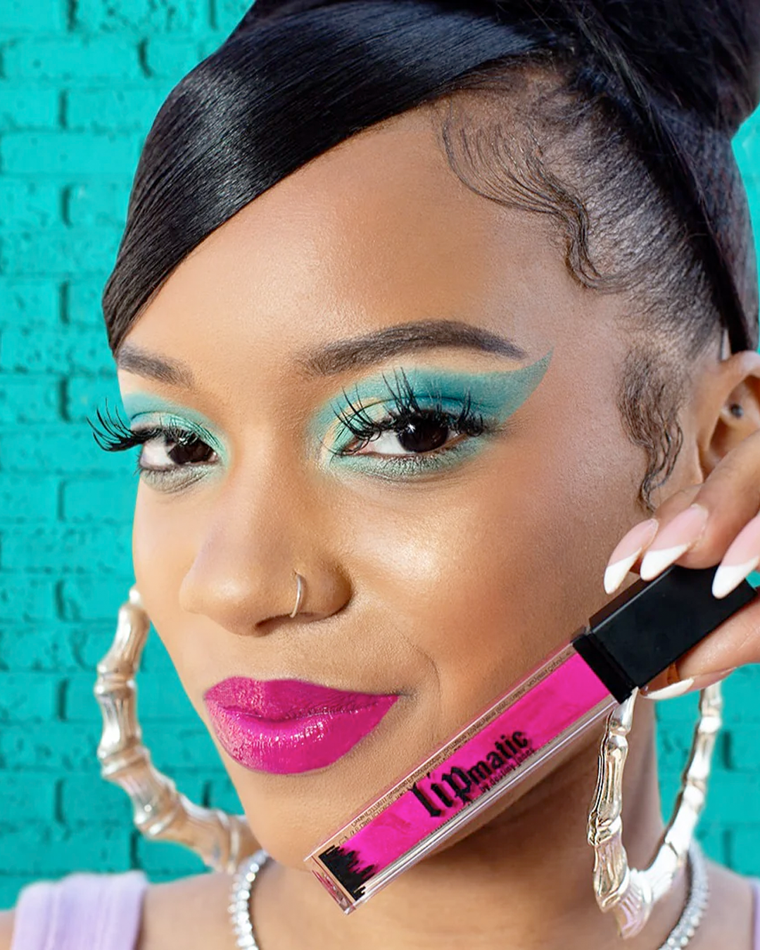 Model wearing Flushing Fuchsia LipShine.