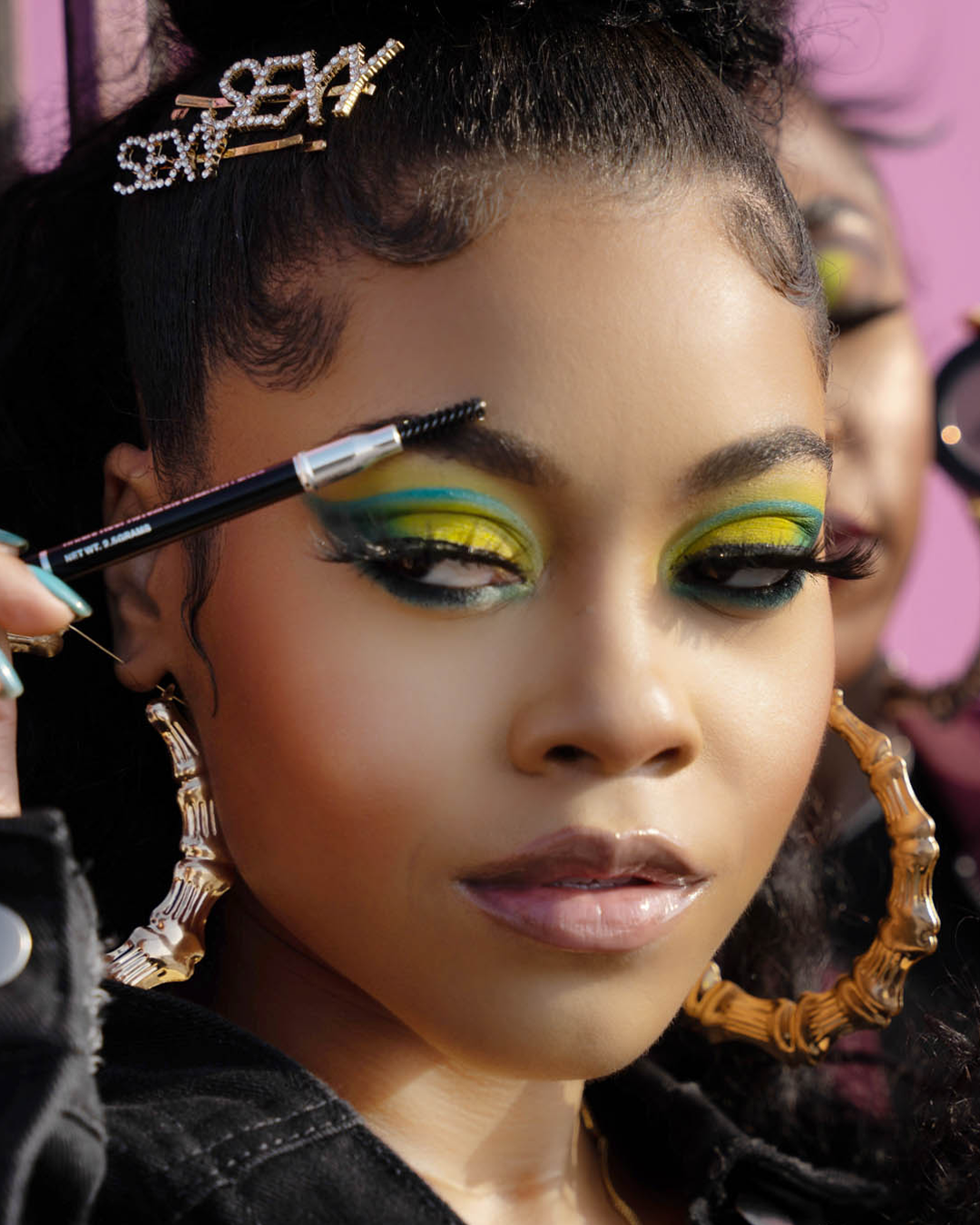 Destiny Jones wearing creative makeup using the Graffiti Collection.