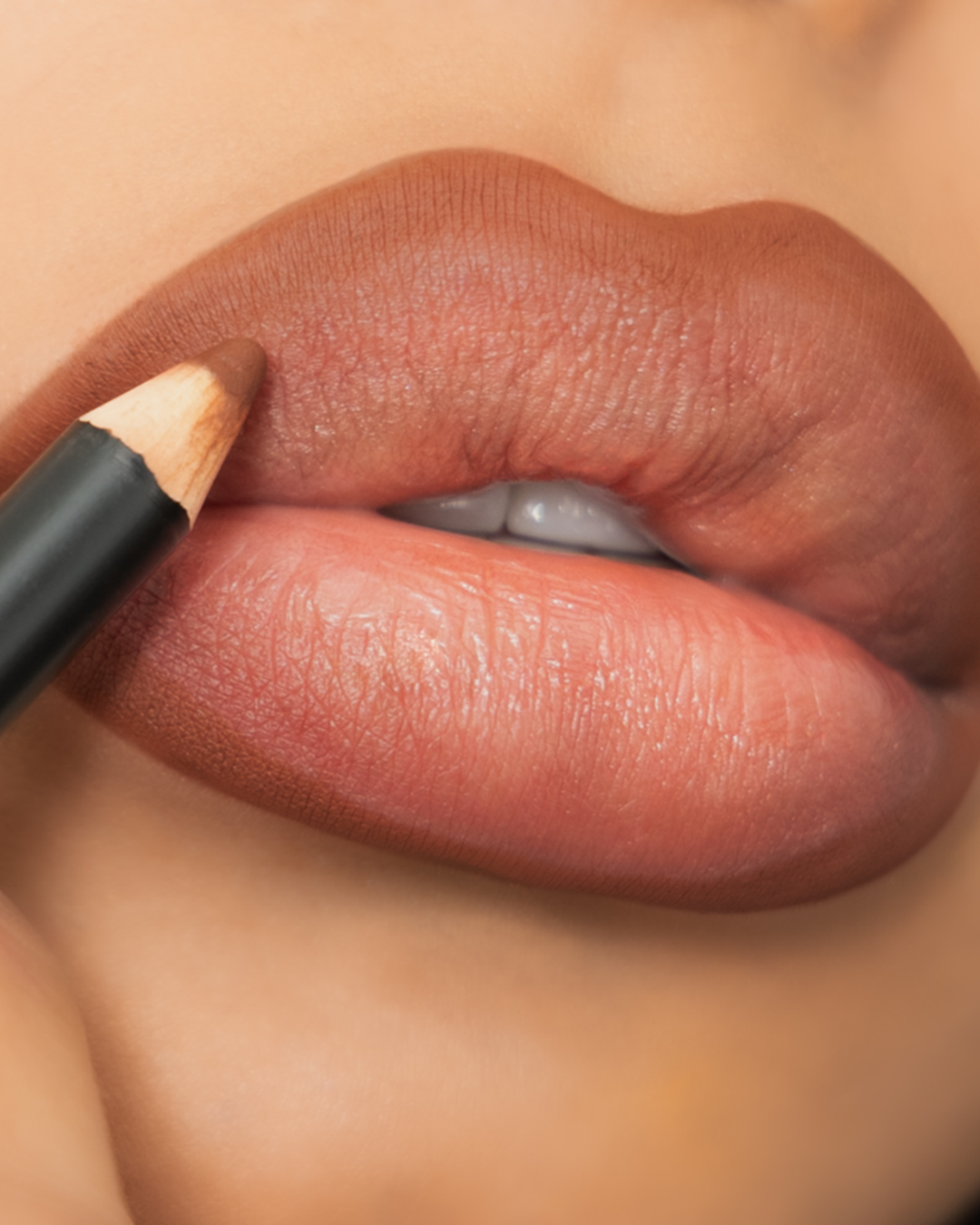 A closeup shot of True Brown LipLiner applied to a model&