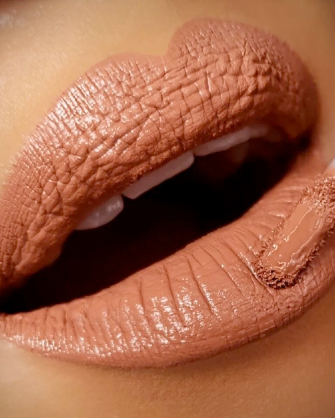 Bronx Brown Sugar Liquid Matte LipStick on a model&