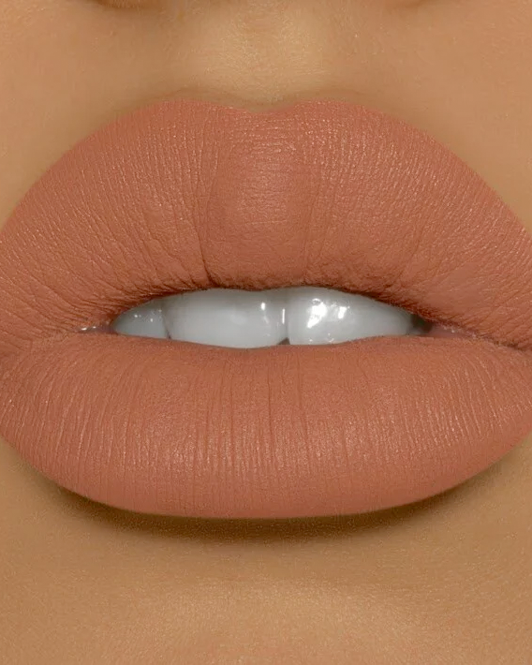 Bronx Brown Sugar Liquid Matte LipStick on a model's lips.