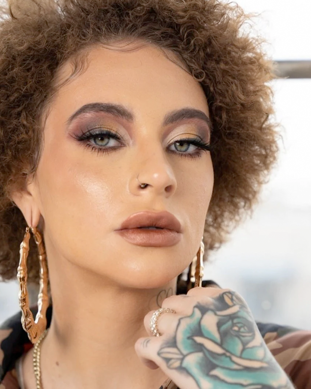 Model wearing Dead Presidents Liquid Matte LipStick and eyeshadow from The All I Need Eyeshadow Palette.