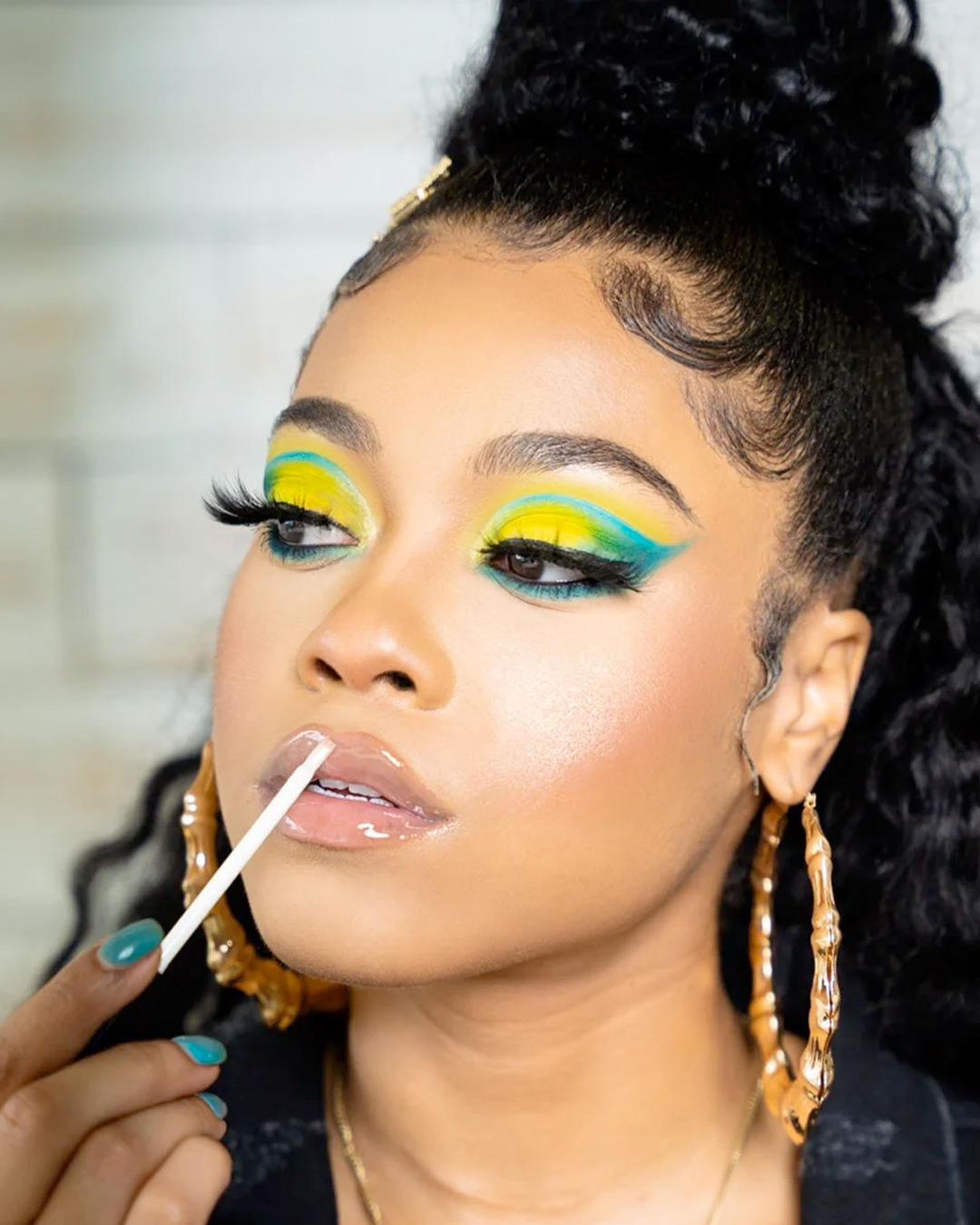 Destiny Jones wearing Glaze Clear LipShine and eyeshadow from The Graffiti Eyeshadow Palette.