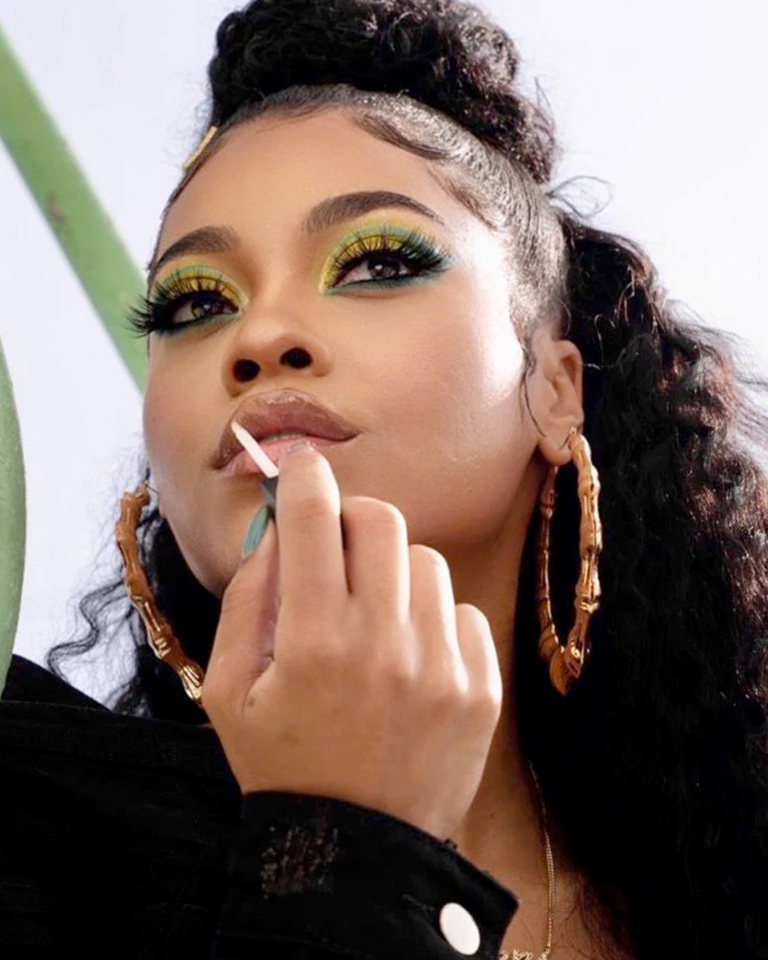 Destiny Jones wearing Glaze Clear LipShine and eyeshadow from The Graffiti Eyeshadow Palette.