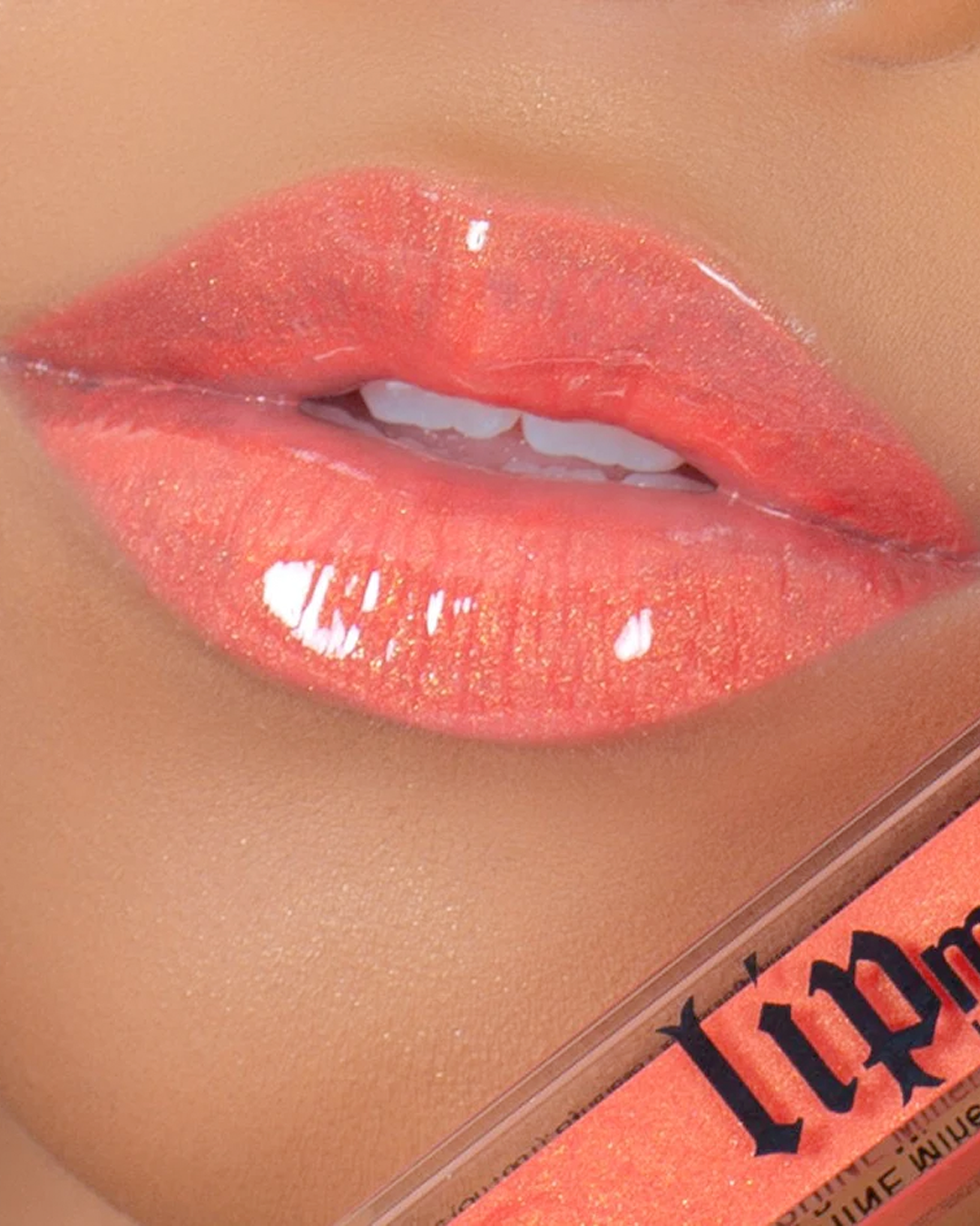 Summer Jam LipShine on a model's lips.