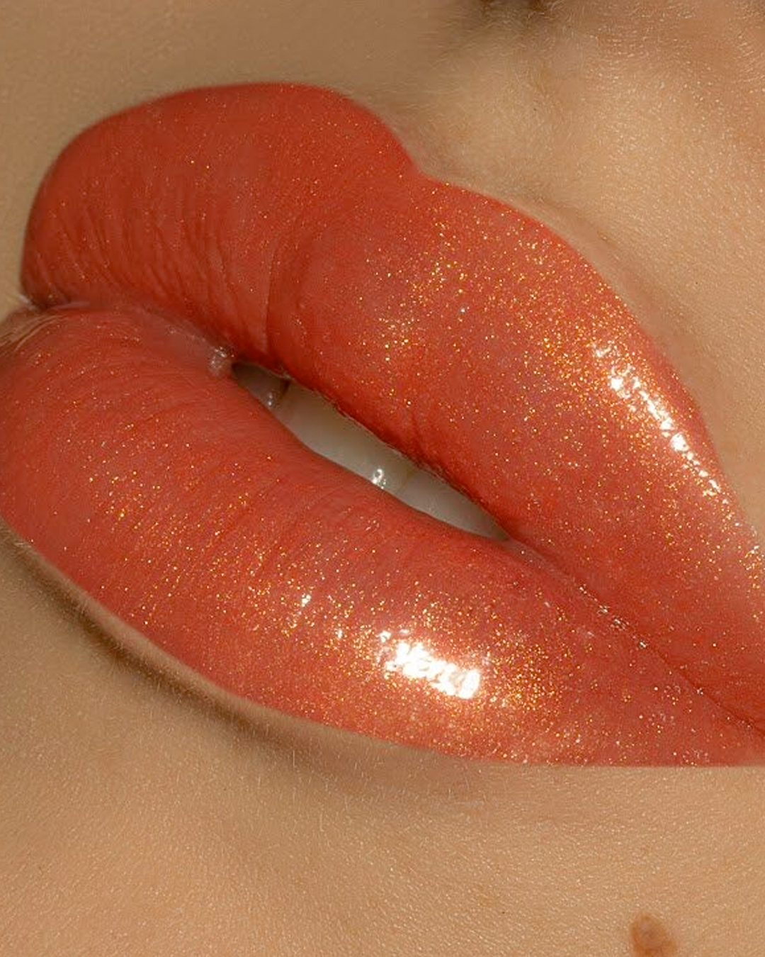 Summer Jam LipShine on a model's lips.