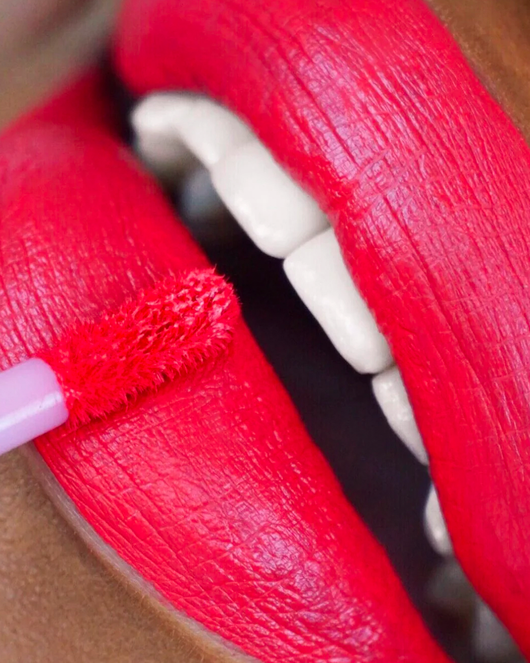 The Big Apple Liquid Matte LipStick on a model's lips.