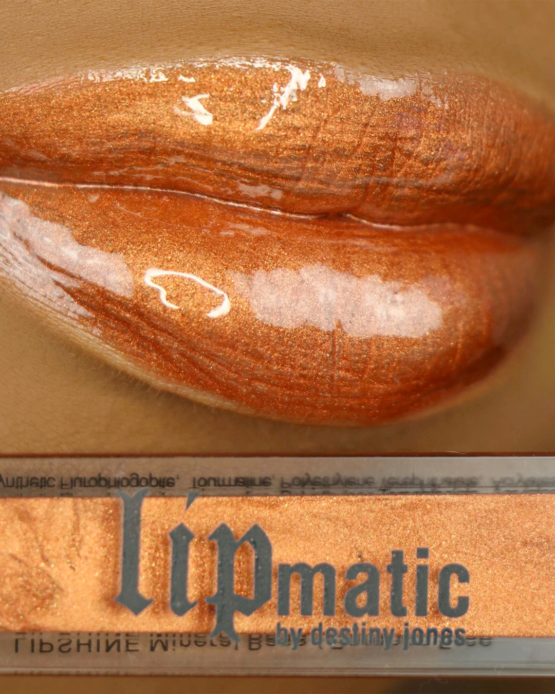 U.N.I.T.Y. LipShine on a model's lips.